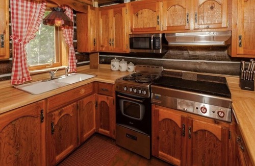 Spooner Cabin | Peaceful retreat on Yellow River. Kayak, canoe or explore our 20 wooded acres!