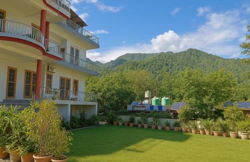 Tapovan Apartment | Pennylane Hotel - Aesthetic Mountain View Rooms With Tropical Garden, Netflix, Pottery Studio, Free Airport Pickup for 7 or more nights stay, 2 minute walk to ganga river in tapovan