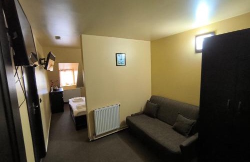 Busteni Hotel | Pensiunea Farfuria plină