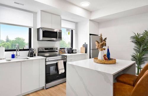 Niagara Falls Apartment | Penthouse 2BR w/Rooftop, Parking & Mins to Falls!