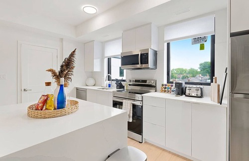 Niagara Falls Apartment | Penthouse 2BR w/Rooftop, Parking & Mins to Falls!