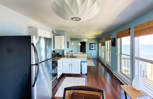 Arnolds Park Condo | Penthouse Suite, gorgeous West Lake Okoboji views, 1 BDRM above shopping center