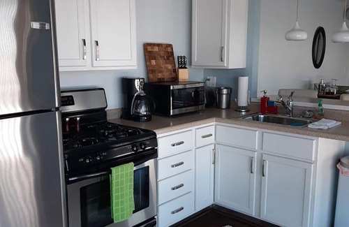 Arnolds Park Condo | Penthouse Suite, gorgeous West Lake Okoboji views, 1 BDRM above shopping center