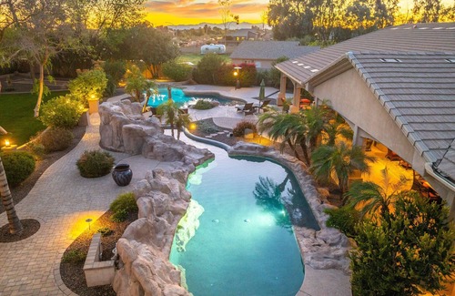 Long Horn Ranch House | Peoria Pool House: resort style back yard w 2 pools, waterfalls, grass acre