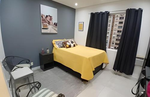 Embare Apartment | Pequeno Paraíso: Kitnet Aconchegante em Santos
