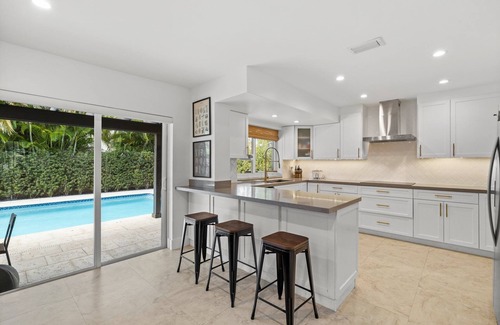 Ludlam House | Perfect Midmod Family House with Backyard Oasis
