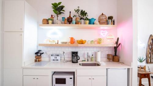 Covington Apartment | Pickle Factory - Neon Lights Studio