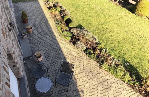 Mechernich House | Picturesque quarry stone house: relaxation in the Eifel