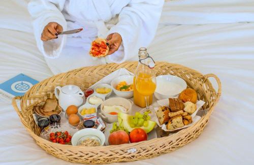 Kini Bed & Breakfast | Pino di Loto Boutique Bed & Breakfast