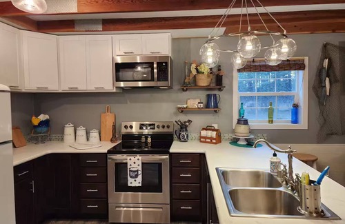 Tumtum Apartment | Pixys Place, forest setting overlooking Lake with pool.