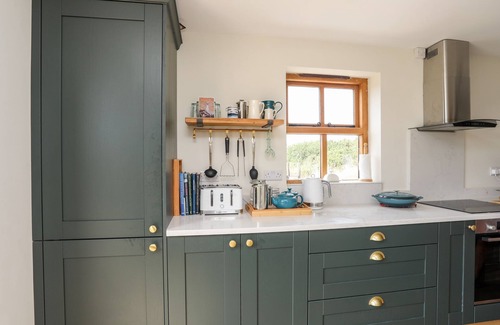 Rhoscolyn Cottage | PLAS COCH RHOSCOLYN, pet friendly, with open fire in Rhoscolyn
