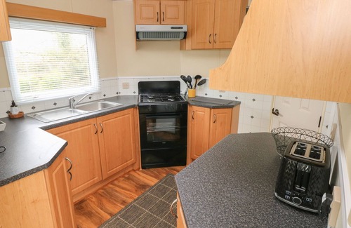 Whitland Cottage | PLEMBURY COTTAGE CARAVAN, family friendly, with a garden in Whitland