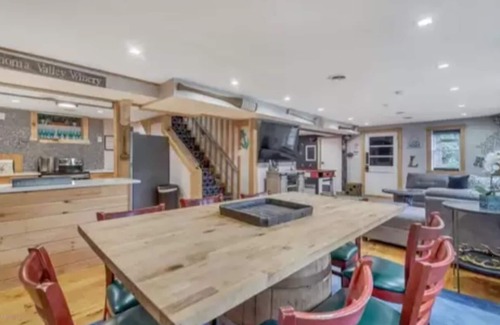 East Stroudsburg House | Poconos Vacation Home For Rent - Riverside Retreat With Inground Pool & Hot Tub.