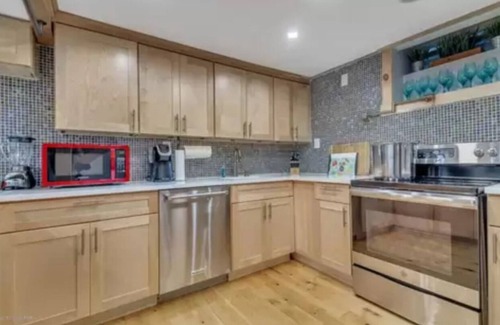 East Stroudsburg House | Poconos Vacation Home For Rent - Riverside Retreat With Inground Pool & Hot Tub.