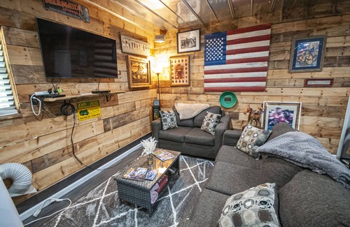 Hayesville Cabin | Ponderosa, Nice Open room by creek with two beds, full bath, living area, TV.