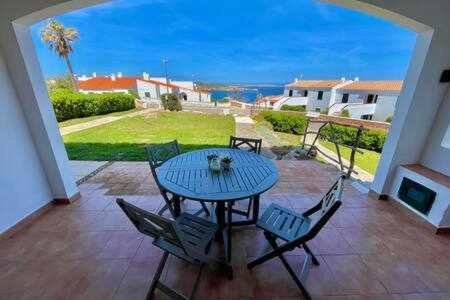 Arenal d'en Castell Apartment | Ponent - Planta baja con vistas al mar y piscinas