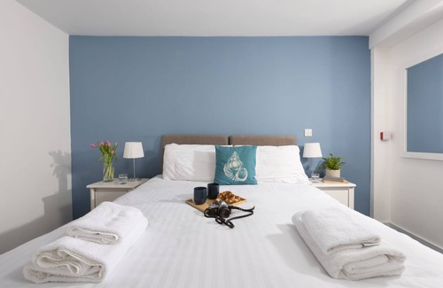 St Just Hotel | Porthcurno, B&B - a hotel room that sleeps 2 guests in 1 bedroom