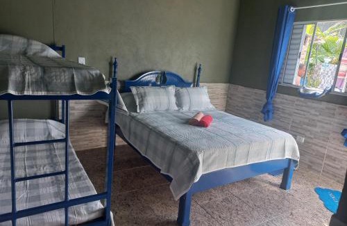 Mongagua House | Pousada Coqueirais