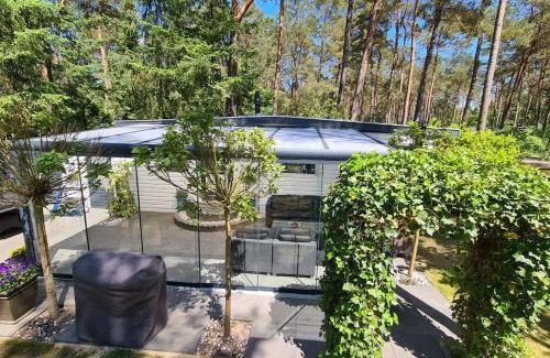 Doornspijk Ski Chalet | Prachtig Boschalet met CV, Airco en Sauna op de Veluwe