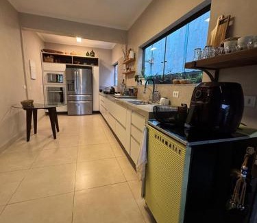 Bertioga House | Praia, piscina e Churrasco
