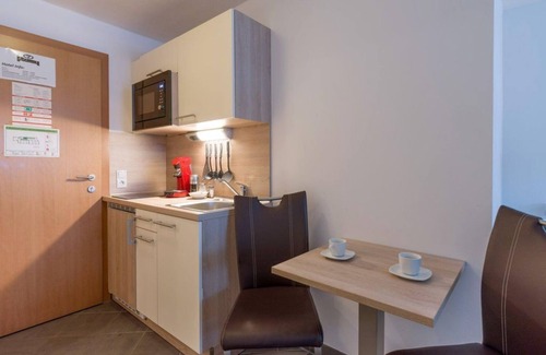 Scheffau am Wilden Kaiser Bed & Breakfast | Premium-studioappartement Balkon, Küche, Couch - Blaiken Appartements