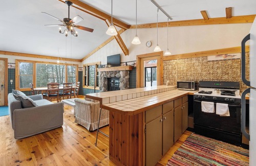 Carp Lake Cottage | Private beachfront cottage, WiFi and AC on Lake Paradise, minutes from Mackinaw