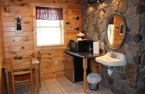 Flintstone Ski Chalet | Private cabin with two full beds. ADA accessible.