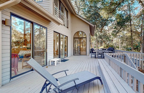 Vanderhorst Plantation House | Private home with large deck and views of a lagoon – walk or bike to the beach