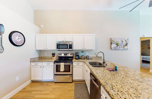 Westridge House | Private pool home with spa, screened patio, central AC, & washer/dryer
