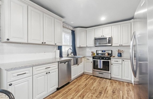 Arvada Plaza Area House | Projector Nights & Park Delights I Designer Reno