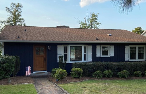 Olivia House | Put your feet up, relax and unwind on the screened porch or go jump in the lake!