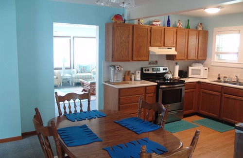 Tawas City House | Quaint Family "Up North" Cottage on Tawas Lake - catch fish, relax, sunsets!