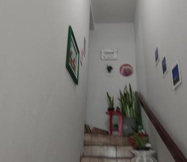 Maringa House | Quarto com banheiro casa da Mari