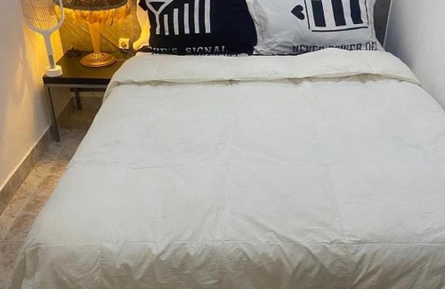 Lubango Apartment | Quarto salinha e WC