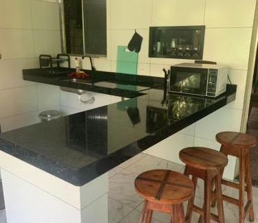 Souza House | Quarto triplo com banheiro em casa compartilhada COP 30