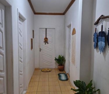 Alvorada House | Quarto triplo com banheiro em Pousada e Restaurante
