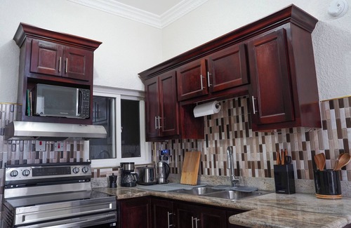 Jack's Hill Apartment | Quiet 2-bedroom apartment with WiFi and patio fitness area in vibrant Kingston