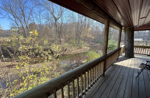 Hallsville Cabin | Quiet Cabin on Walnut Creek, Covered Deck, Hot Tub, Swimming Hole, Shelter House