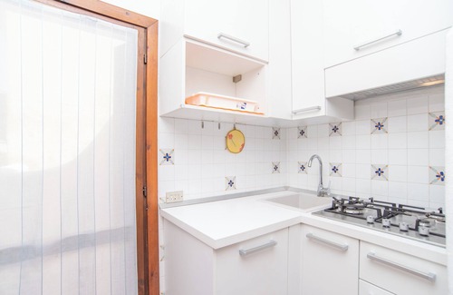 Punta Sardegna Apartment | Quiet Holiday Apartment with Terrace with Sea View; Parking Available; Pets Allowed