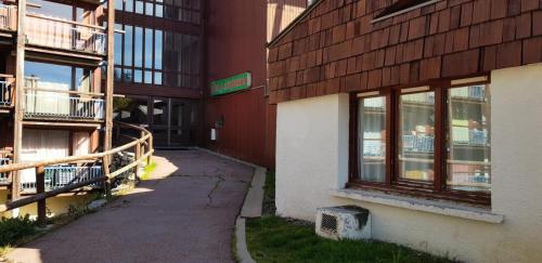 Arc-1800 Apartment | Résidence Lauzieres - Appartement 2 pièces pour 7 personnes skis aux pieds et proche des commerces dans le village du Charvet à Arc 1800 MAE-1876