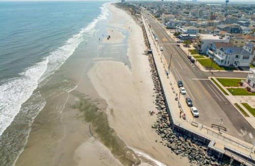 Brigantine House | Radiant Beach Block Condo Parking Patio