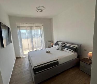 Rome Province Apartment | Red Sky Apartment - Porta di Roma by GHOR