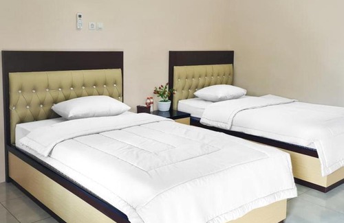 Sampit Hotel | RedDoorz @ Jalan Nyai Enat Sampit