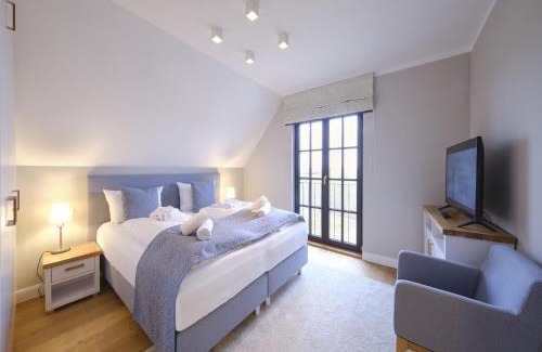 Dranske House | Reetland am Meer - LuxusPlus Reetdachvilla mit 4 Schlafzimmern und Kamin G09