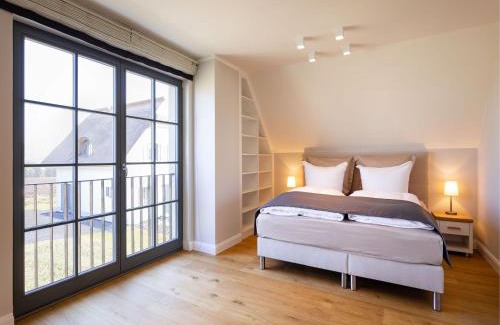 Kreptitz House | Reetland am Meer - Premium Reetdachvilla mit 3 Schlafzimmern, Sauna und Kamin E05