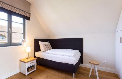 Kreptitz House | Reetland am Meer - Premium Reetdachvilla mit 3 Schlafzimmern, Sauna und Kamin E05