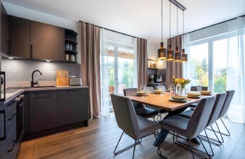 Am Salzhaff House | Reetsnacker - Ferienhaus mit Kamin, Sauna und Whirpool für 8 Personen