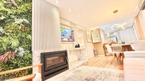 Vila Luiza Apartment | Refúgio Moderno com Lareira em Canela