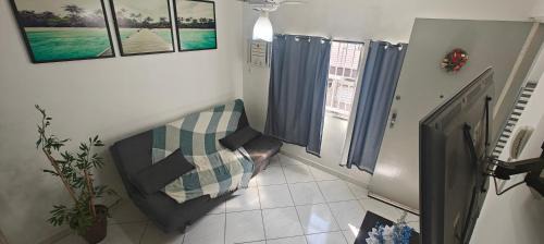 Aparecida Apartment | Refúgio Santista - Seu lar com vaga no litoral