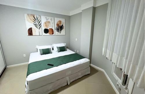 Guarapari Apartment | RefugioBacutia- Prédio FRENTE MAR Bacutia- 6 pessoas- 3 Quartos com AR sendo 1 suite - varanda- sala de estar e jantar Ampla -Piscina e Sauna no Prédio